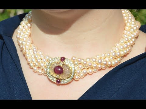 Mid Century 18ct gold cultured pearl torsade necklace with ruby and diamond clasp.